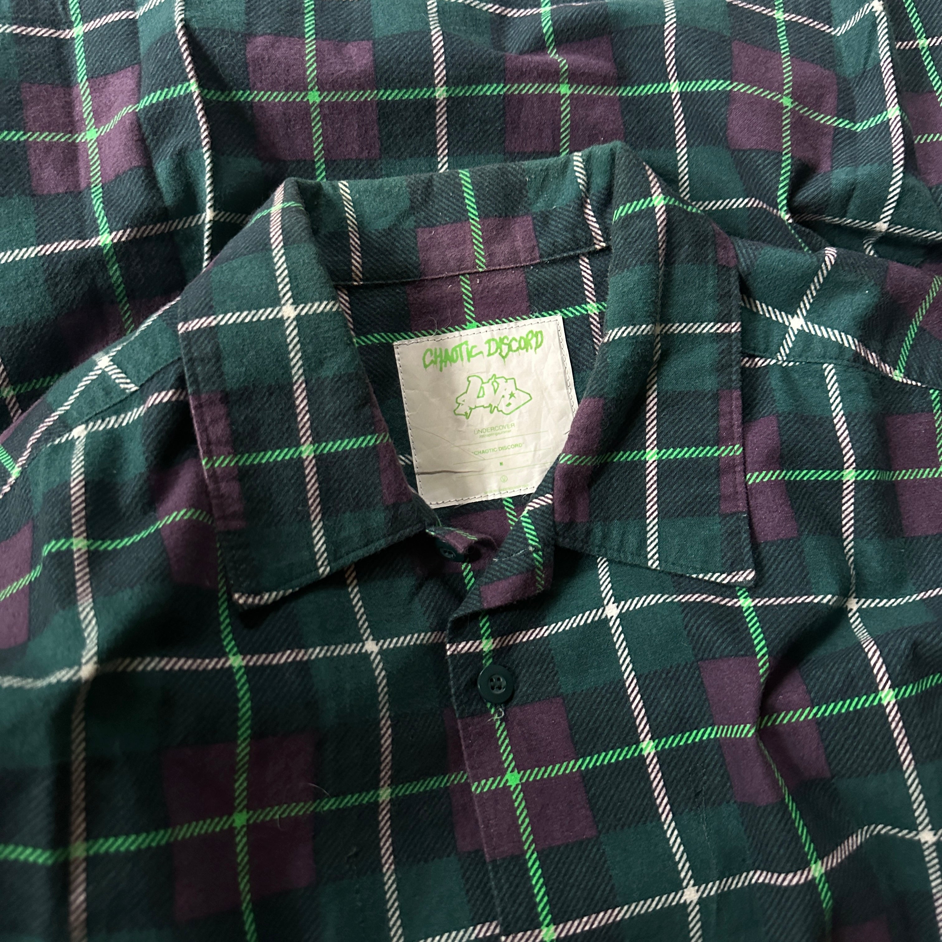 SS01 Undercover “Chaotic Discord” Button-Up Shirt