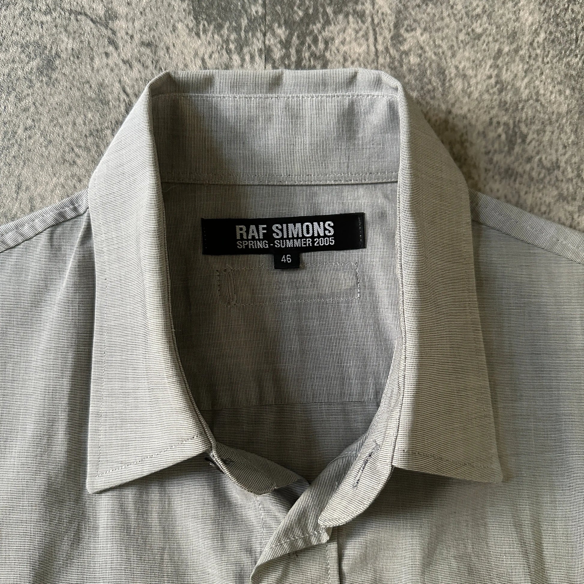 SS05 Raf Simons “History of the World” Cut-Off Shirt - 269archive